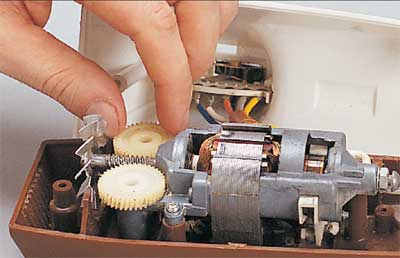 Inspect and lubricate the gears; make sure excess lubricant does not touch the motor or electrical components.