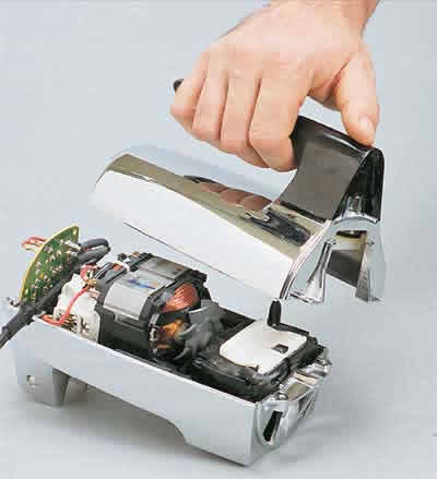 Disassemble a hand mixer to access the motor.